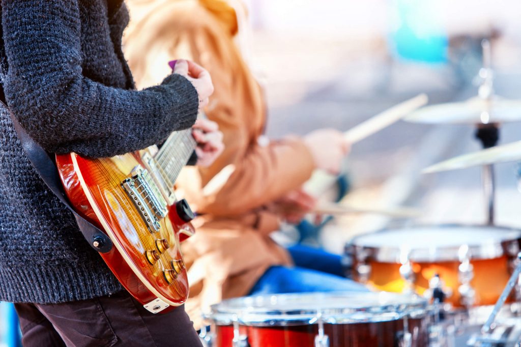 guitar and drums performers