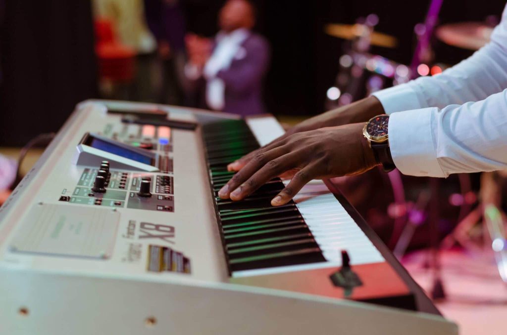 pianist playing the piano on stage