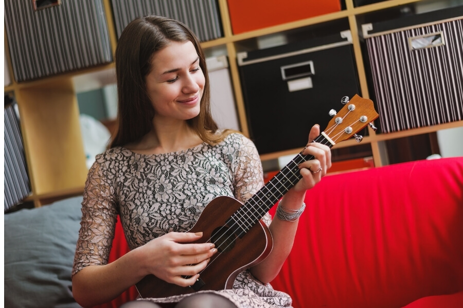 Woman playing Ukelele