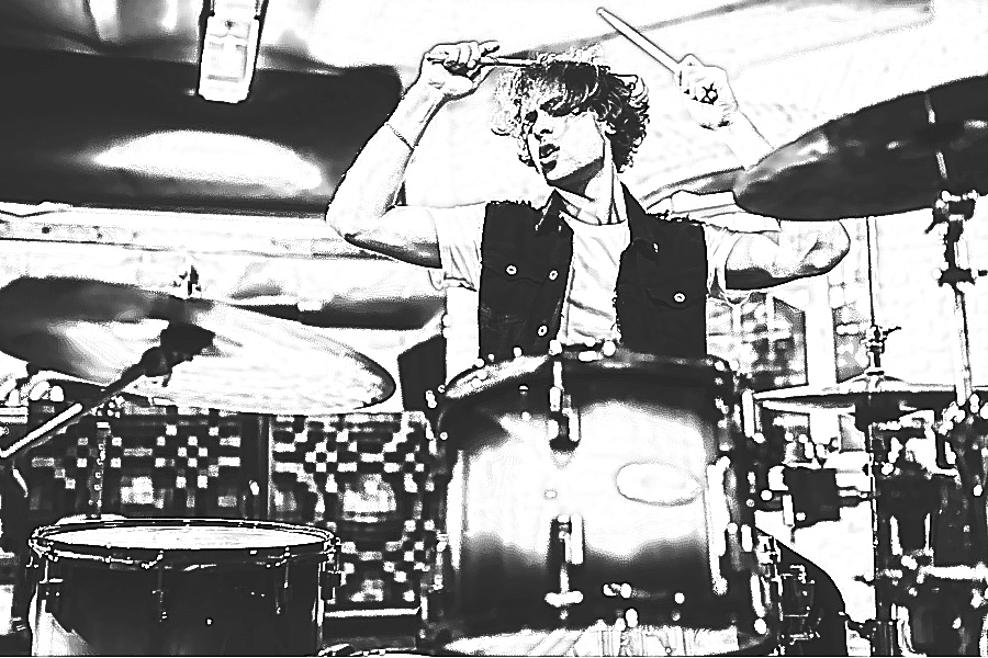 man with drum set