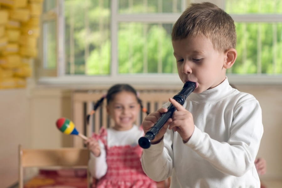 Playing flute woodwind instrument