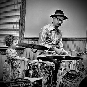 Trenten teaching drums